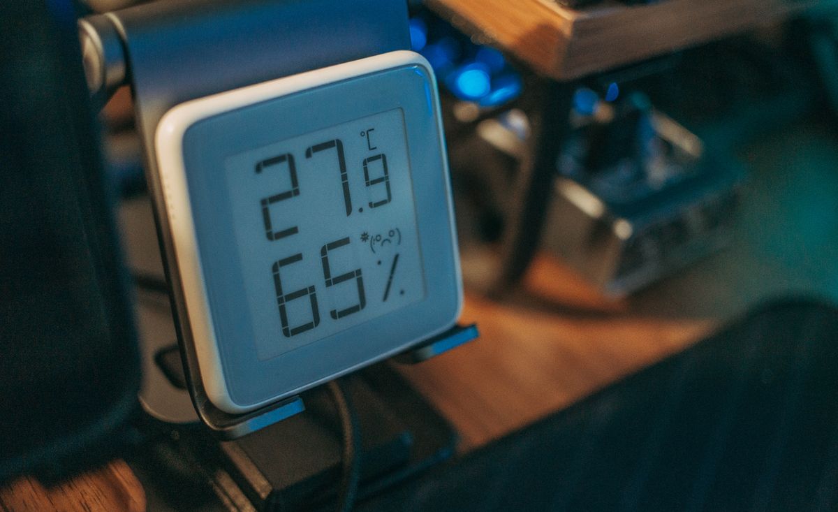 Digital hygrometer displaying 65 percent relative humidity indoors